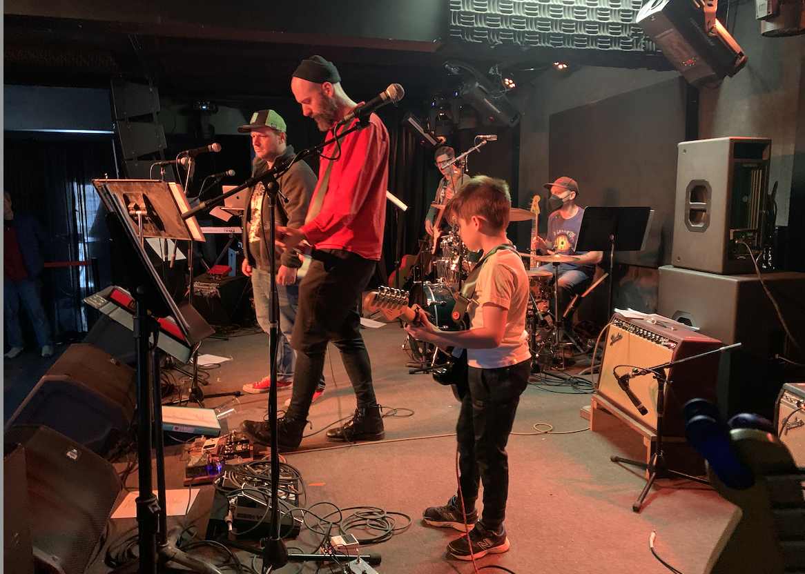 The stage at Deep Dive in Ithaca with my son playing guitar.